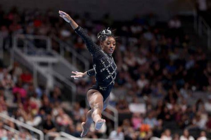 PHOTO: Simone Biles competes in the artistic gymnastics women's balance beam final of the Tokyo 2020 Olympic Games at Ariake Gymnastics Centre in Tokyo, Aug. 3, 2021.
